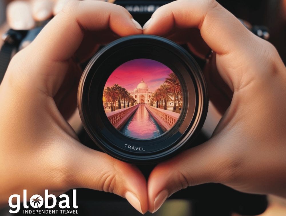 Heart shaped hand around lens